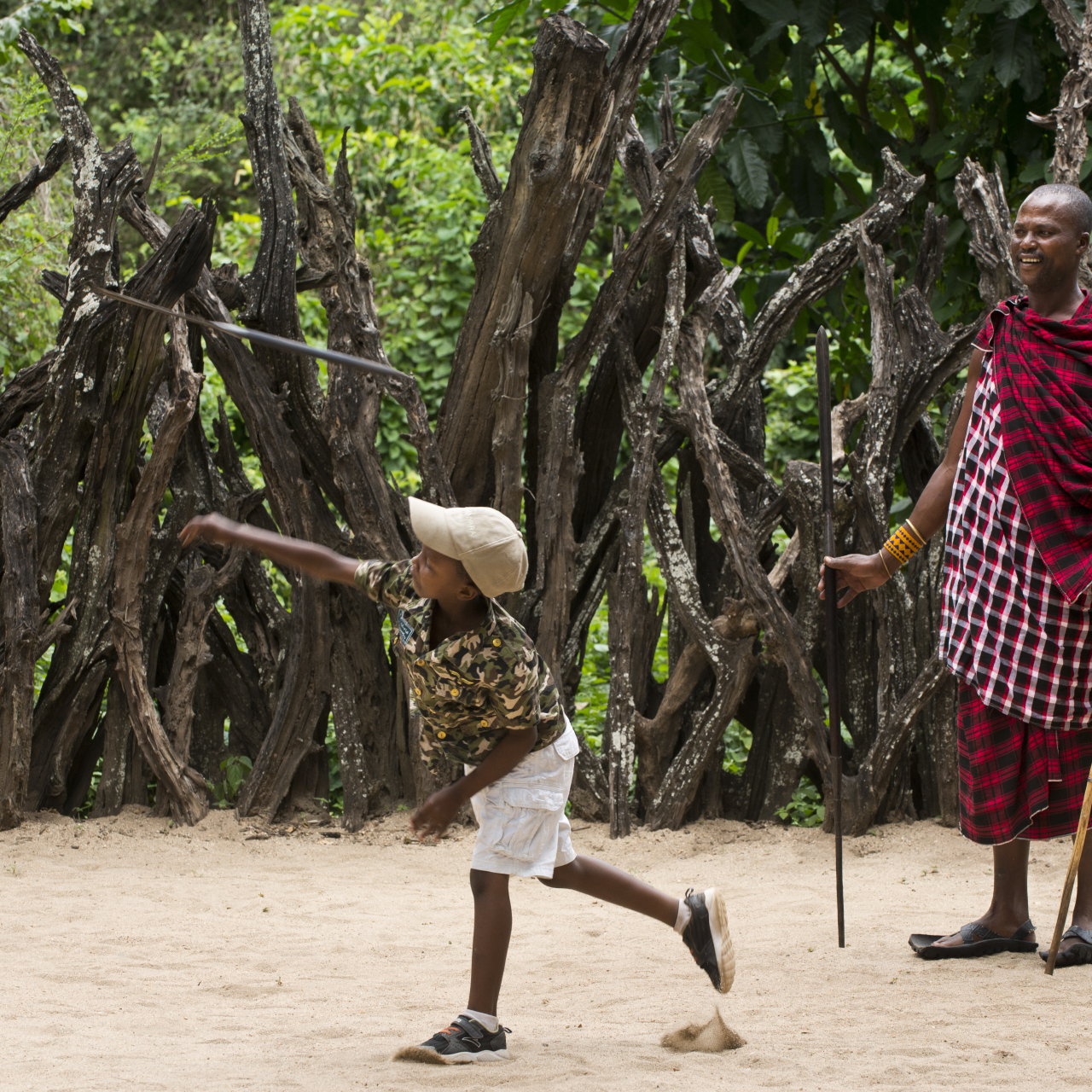 GALLERY Tanzania Lake Manyara Tree Lodge WIL Dchild activities spear throwing with Maasai