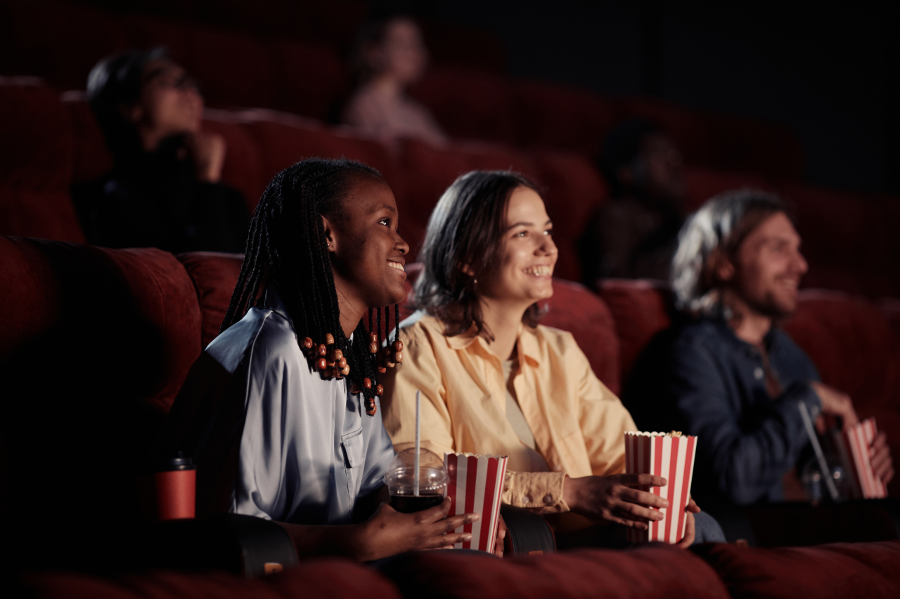 Happy girls enjoying watching the movie 2026 03 23 22 59 35 utc