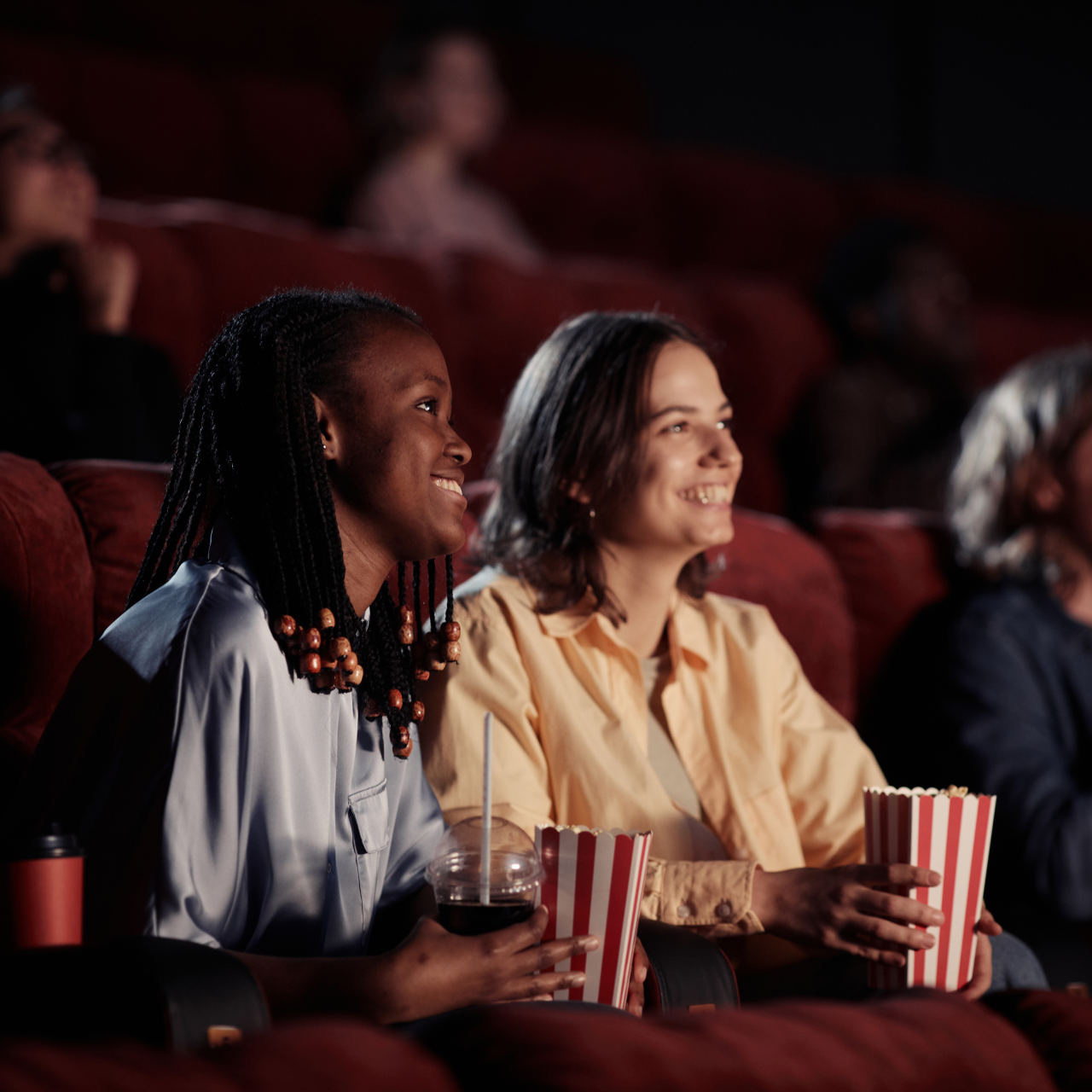 Happy girls enjoying watching the movie 2026 03 23 22 59 35 utc