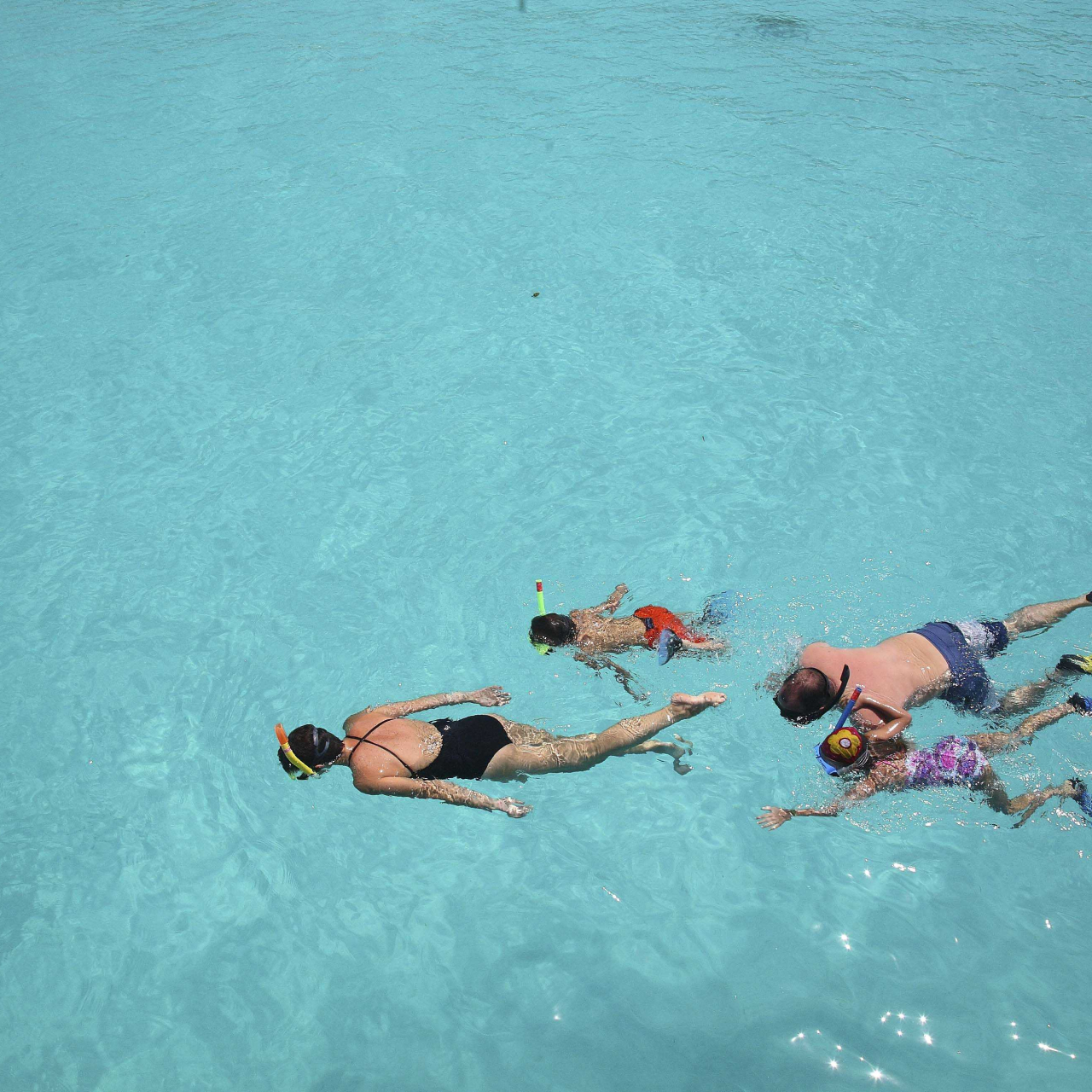 Beyond Zanzibar Mnemba island Experience snorkelling kids and family in the water 1
