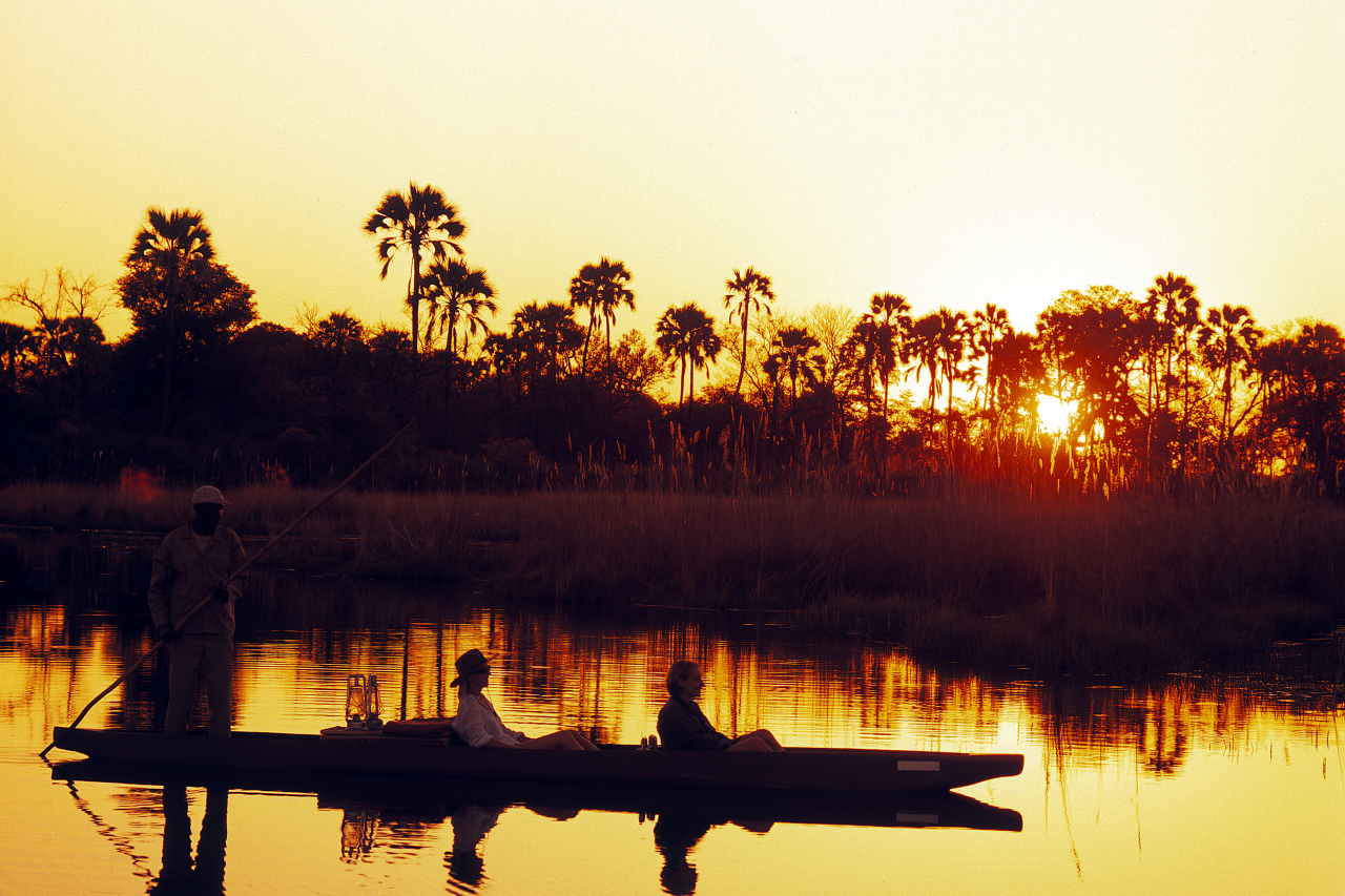 And Beyond Botswana Nxabega Okavango Tented Camp Experience Mokoro ride at sunset High Resolution Width5000px