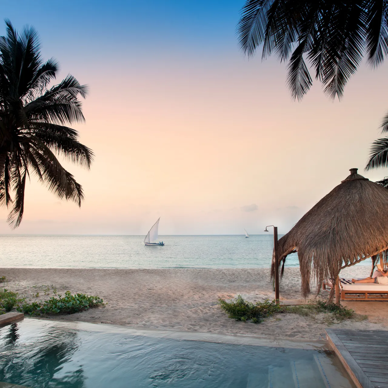 Benguerra Island Cabana pool and beach with guest High Resolution Width5000px