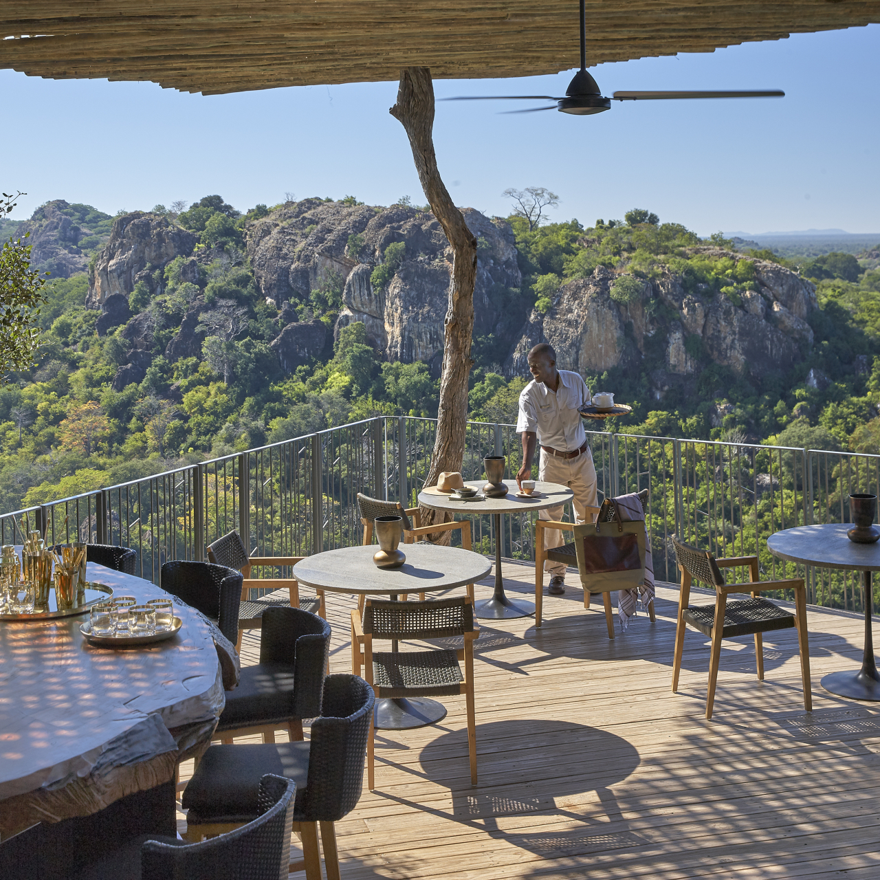 GALLERY Singita Pamushana Lodge Waiter on Deck