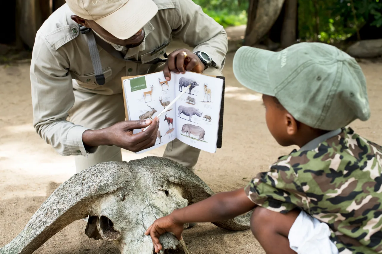 And Beynd Tanzania Lake Manyara Tree Lodge WIL Dchild activities with guide ranger and guides journal 4 High Resolution Width5000px